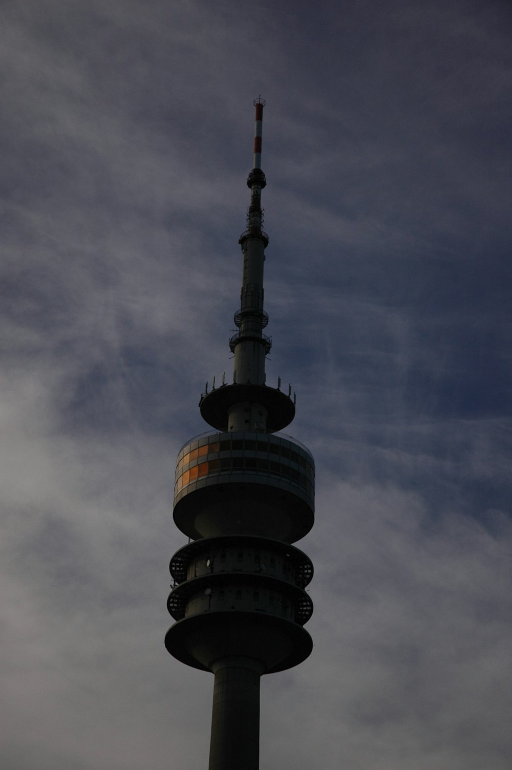 brown and gray tower building under white and blue sky during daytime