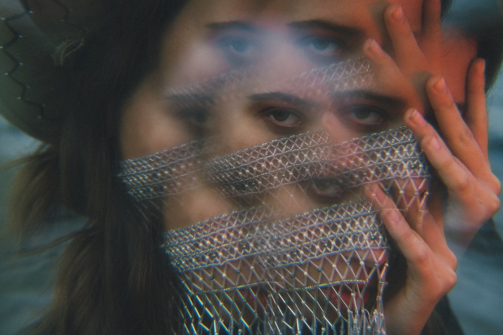 woman wearing gray mesh scarf