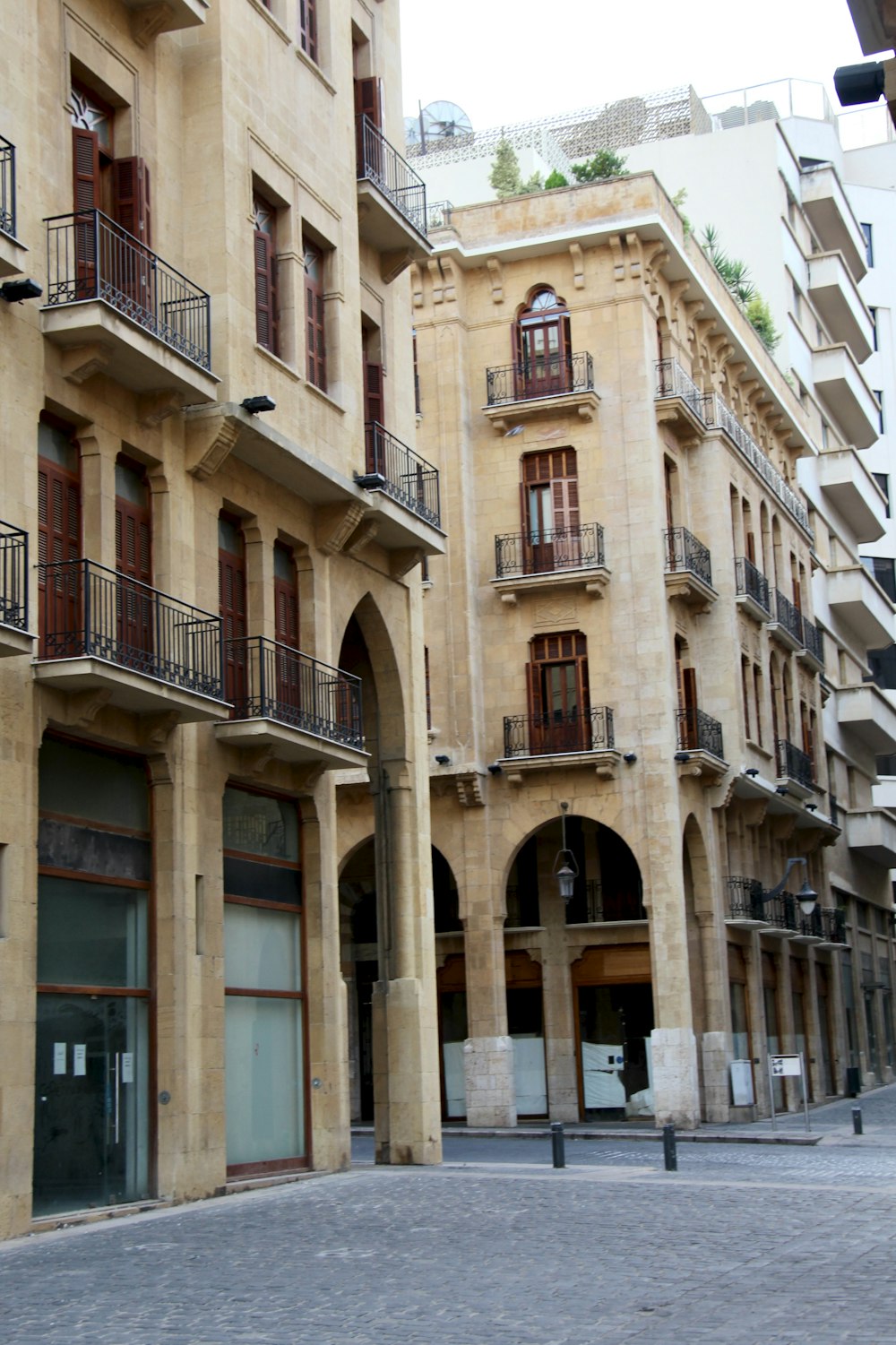 beige concrete house at daytime