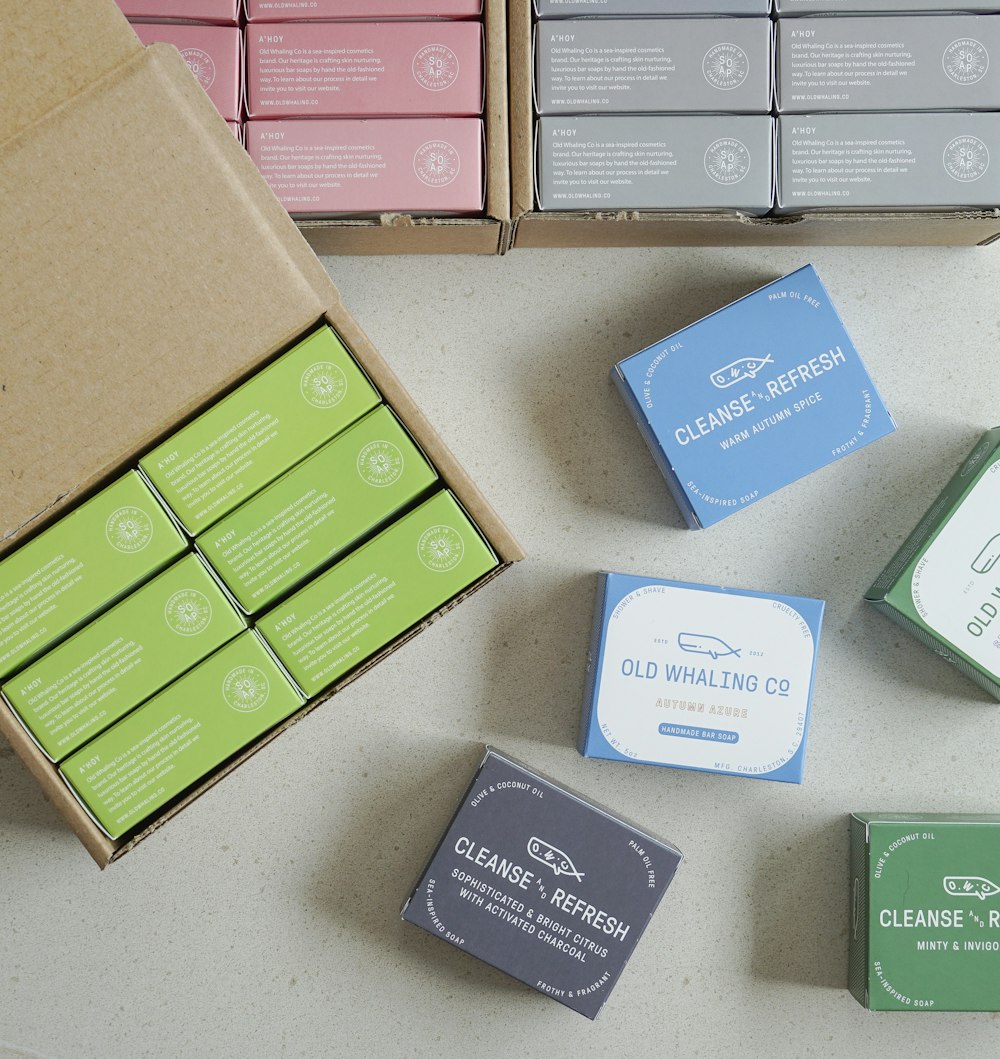 a table with several boxes of soaps on it