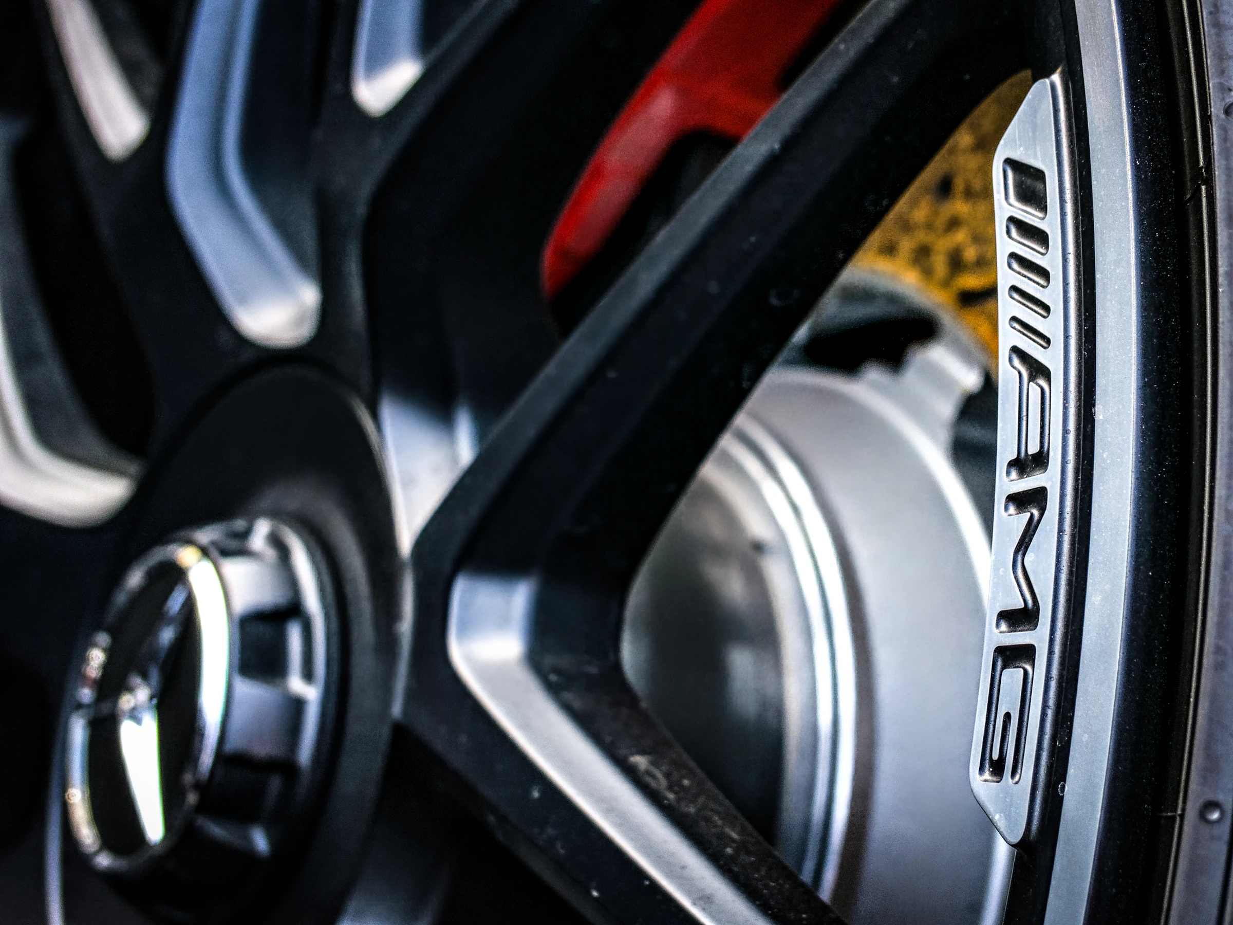 Close-up of a black luxury performance-car wheel