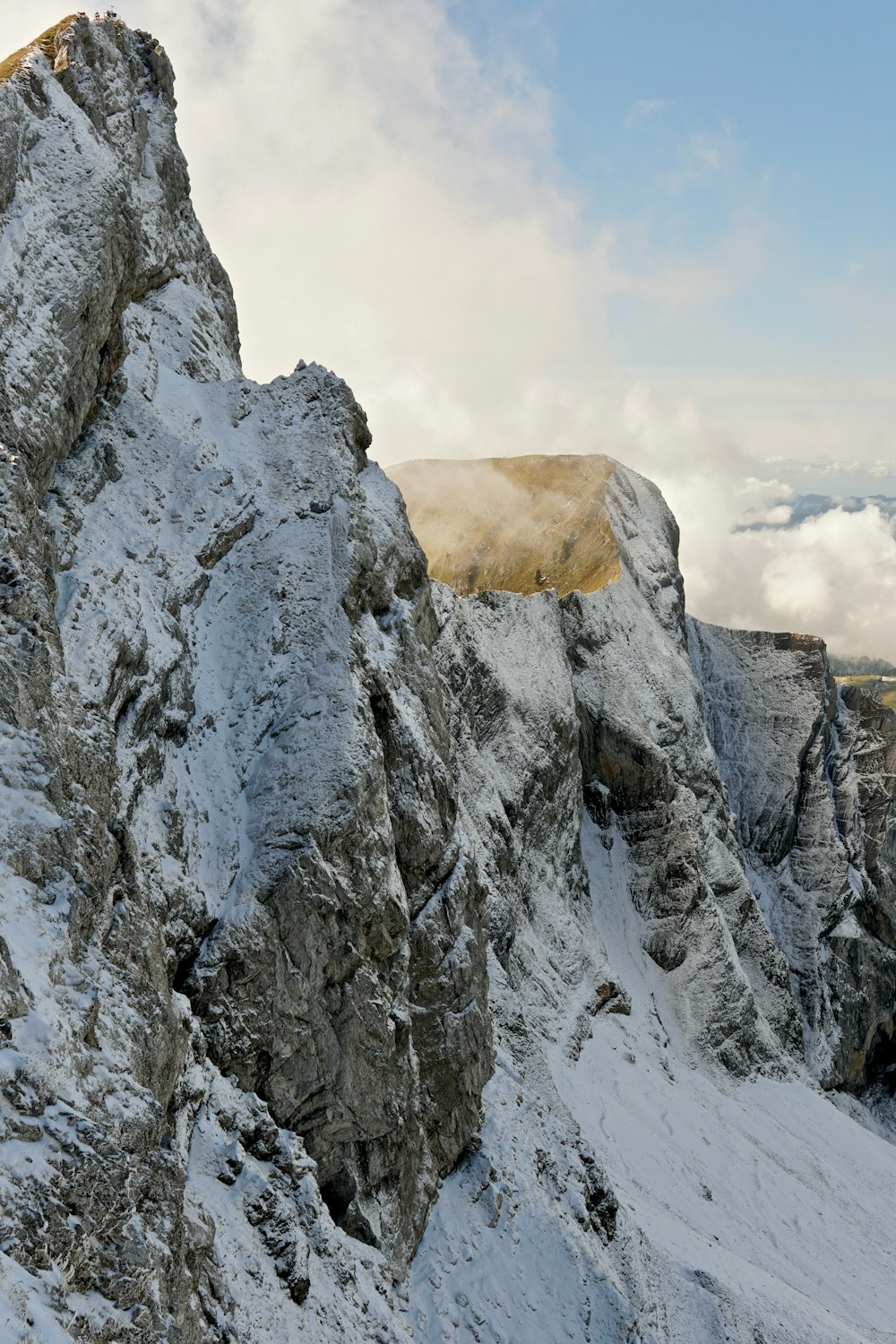 mountain at daytime during winter season