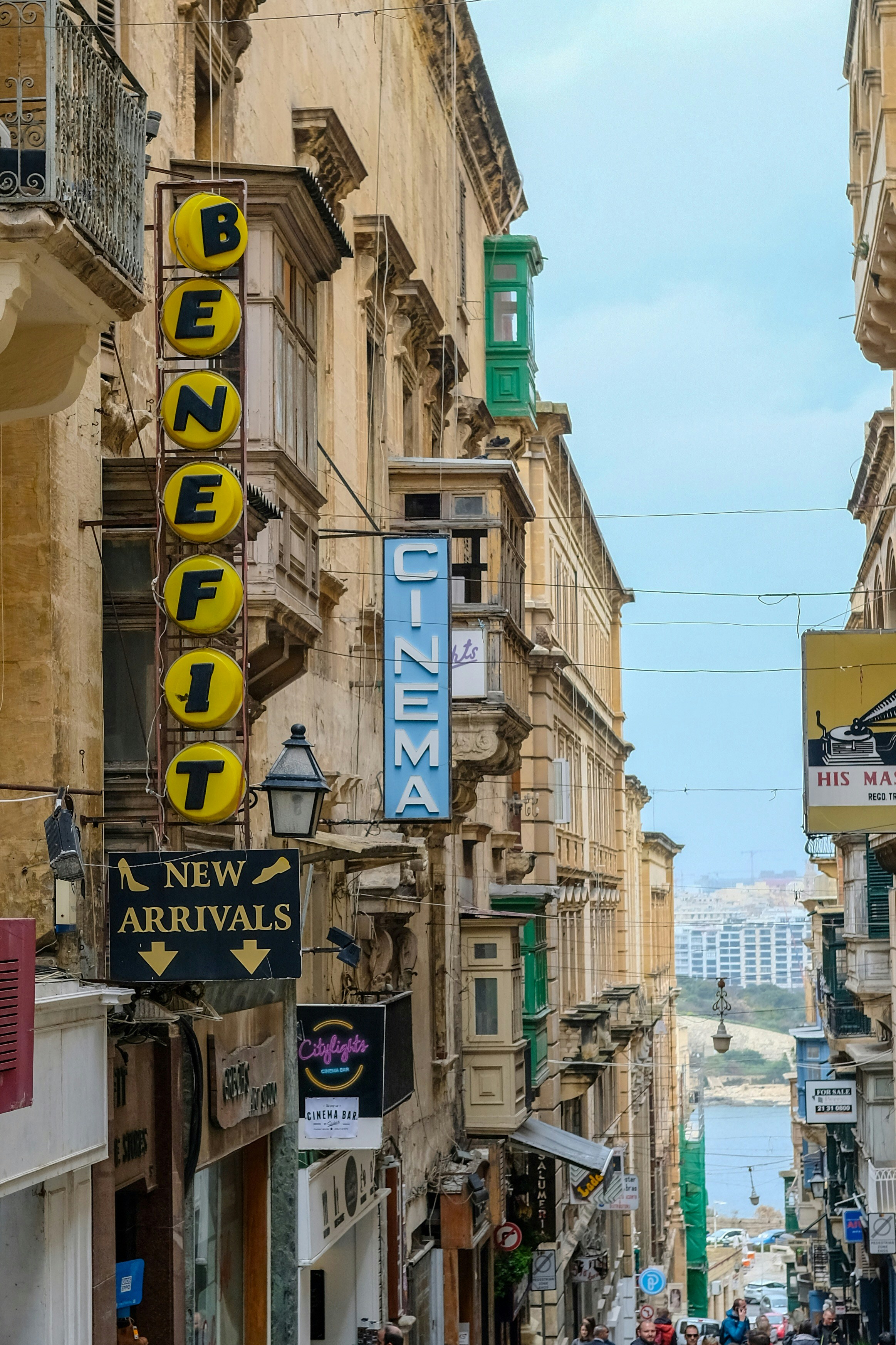 Assorted-color signage at daytime photo – Free Human Image on Unsplash