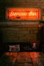 Warm, inviting interior of Forest Espresso with natural light highlighting the coffee bar and cozy seating.