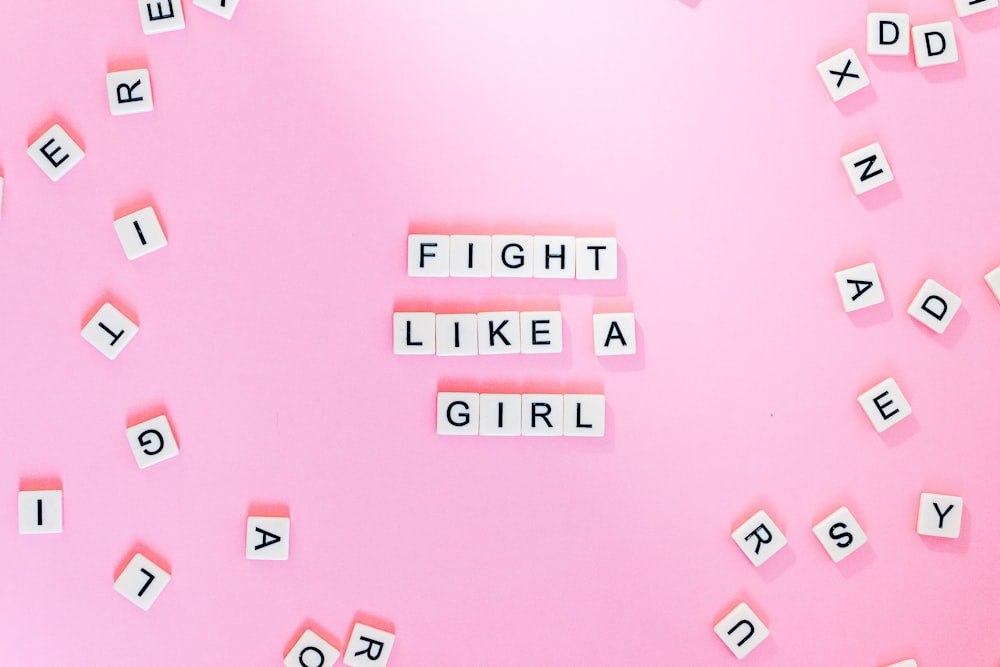 Fight Like A Girl text tiles on pink
