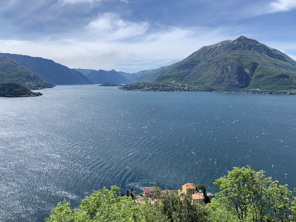 body of water and green mountain