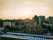 City skyline with sunrise, illustrating growth and new opportunities in Indonesia.