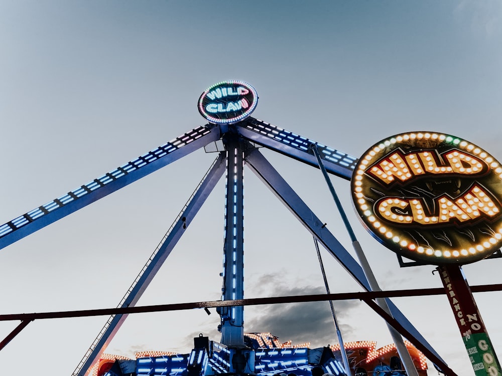 a close up of a ferris wheel at a carnival