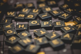 black scrabble tiles