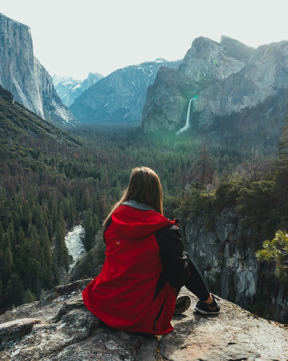 woman wears red hoodie jacket