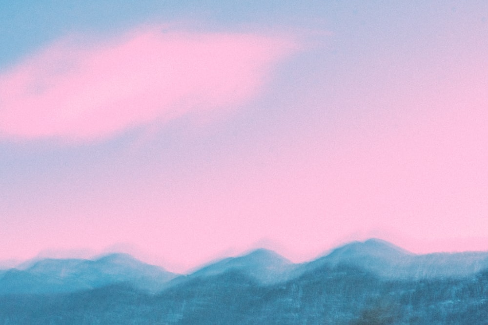 mountain under pinkish sky during daytime
