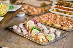 assorted foods on tray on wooden surface