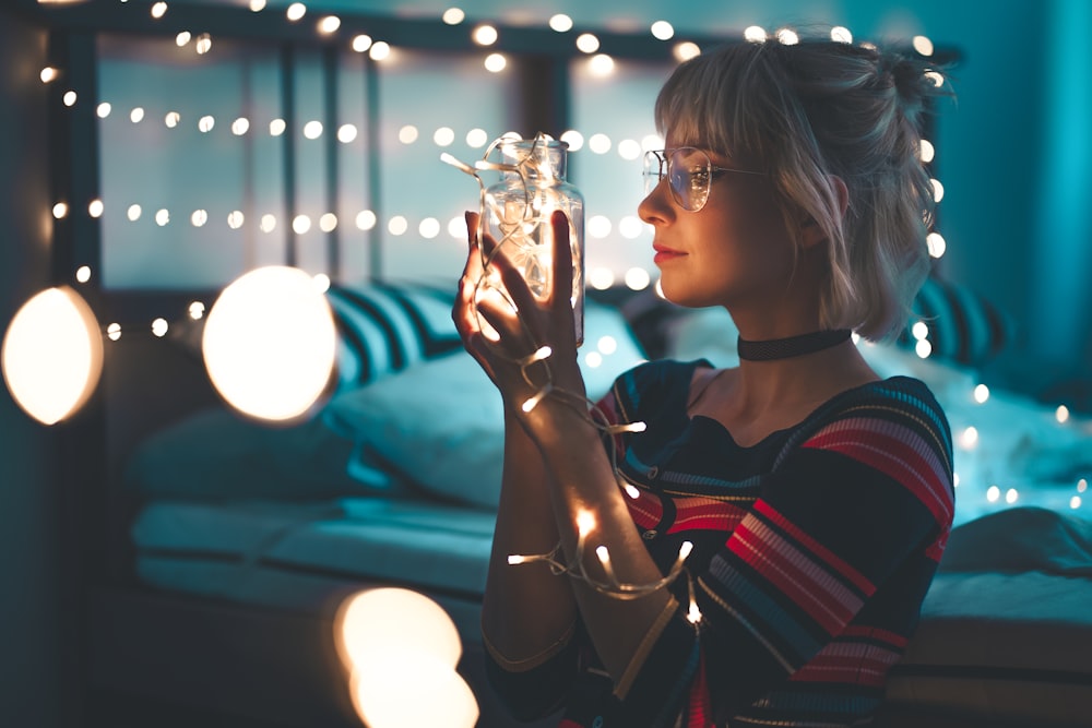 woman holding jar