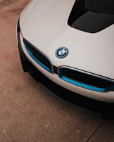 Elegant shot of BMW car exterior with focus on the front grille and headlights.
