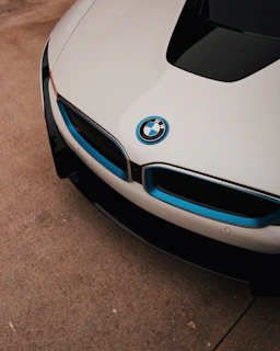 Elegant shot of BMW car exterior with focus on the front grille and headlights.