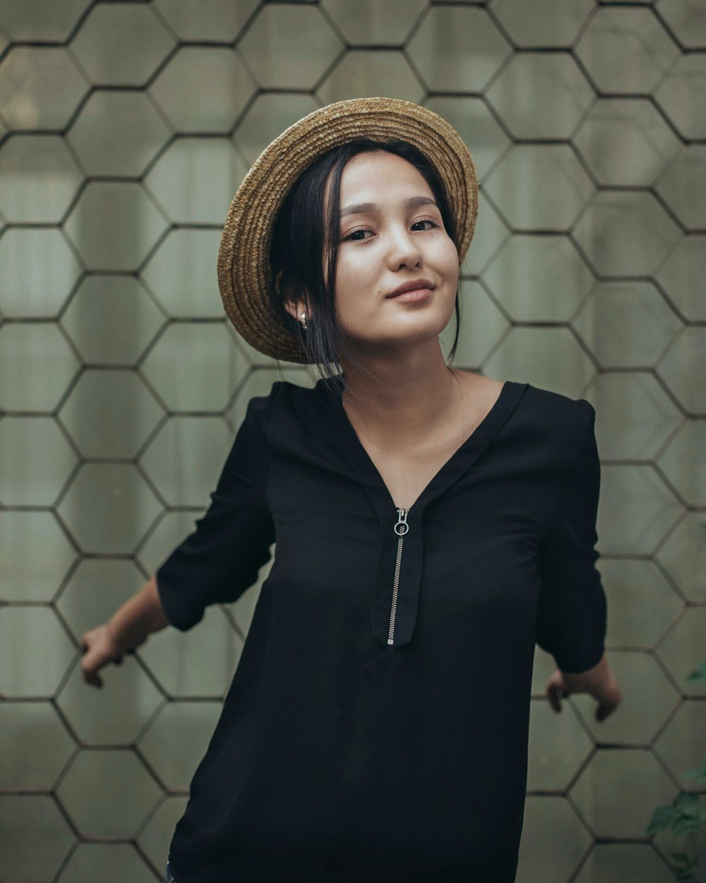 woman standing near fence