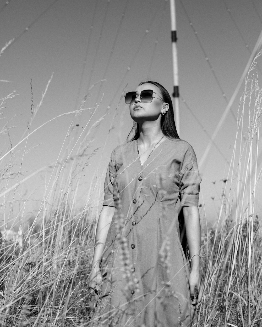 woman standing grass field