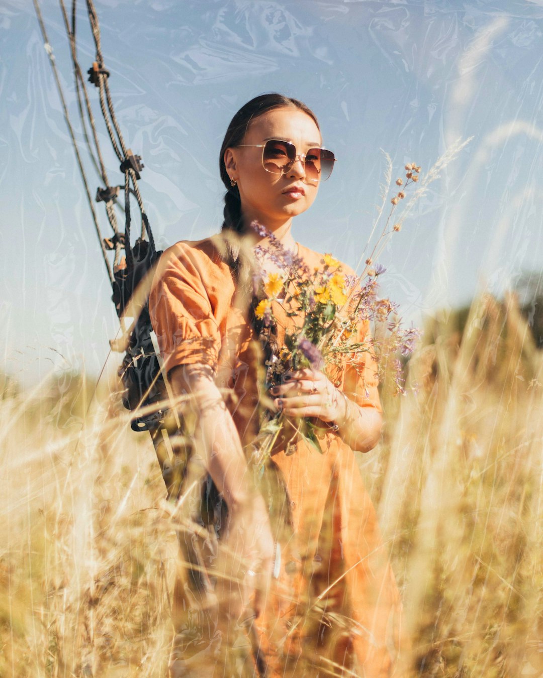 woman holding flower bouquet