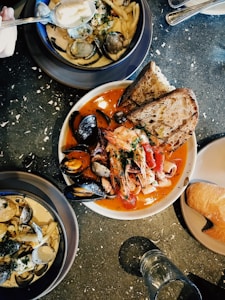 round white ceramic bowl with seafoods