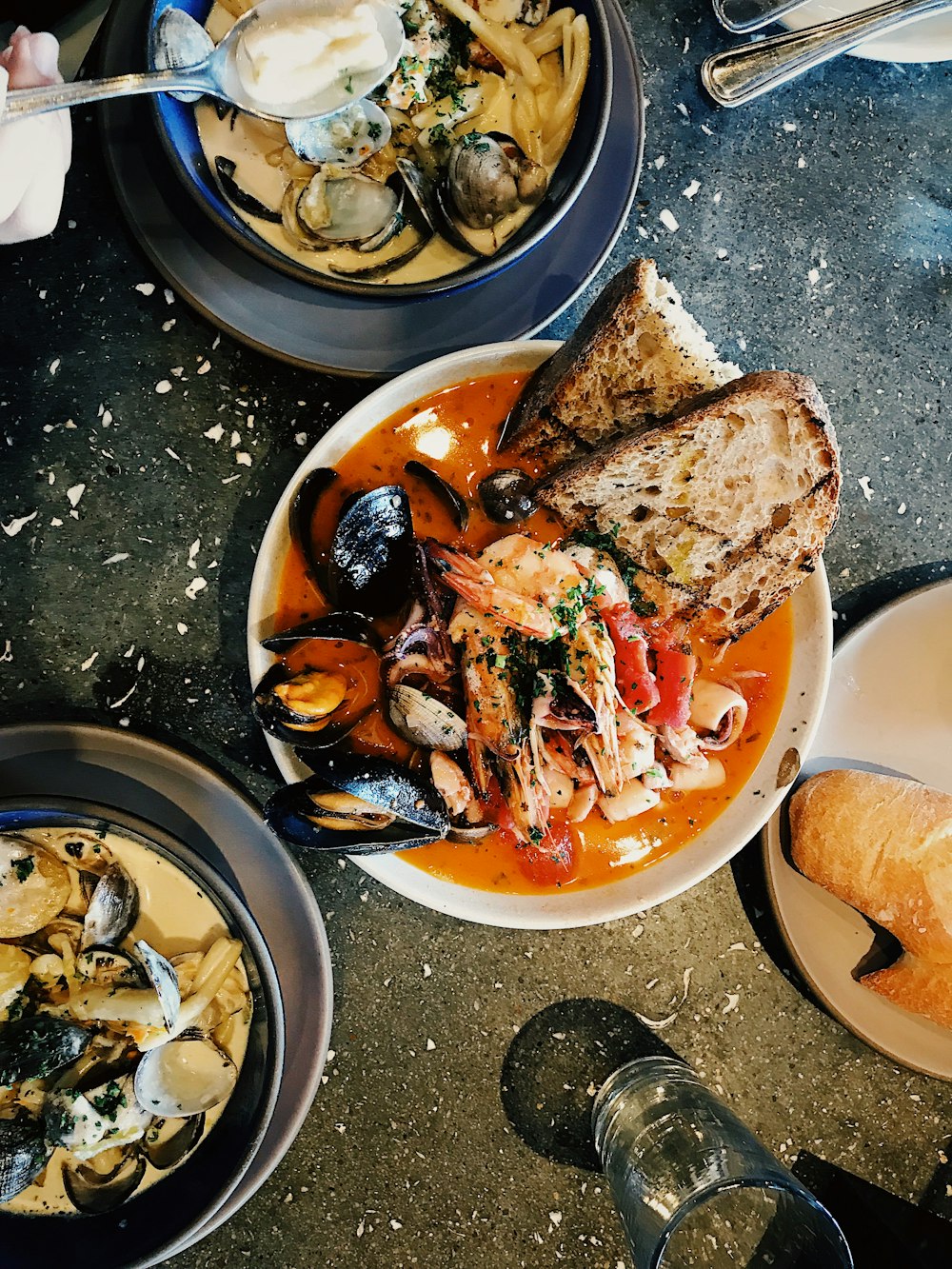 round white ceramic bowl with fish chowder