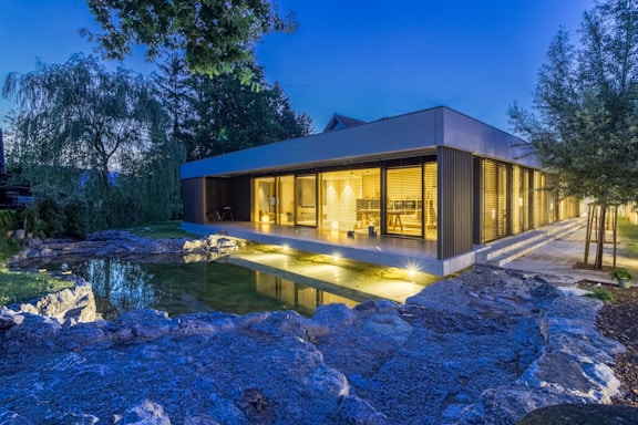 gray and black house under blue sky