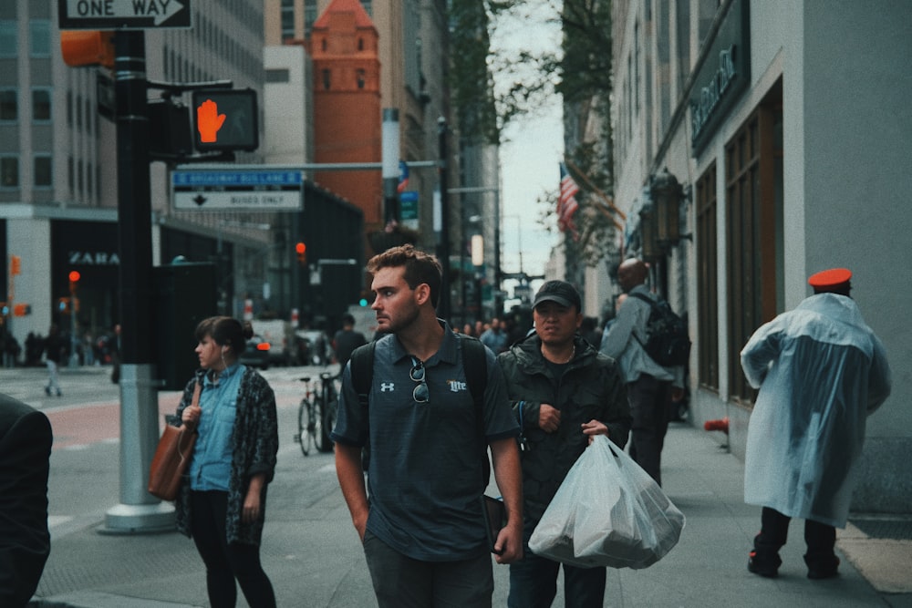 unknown persons walking outdoors