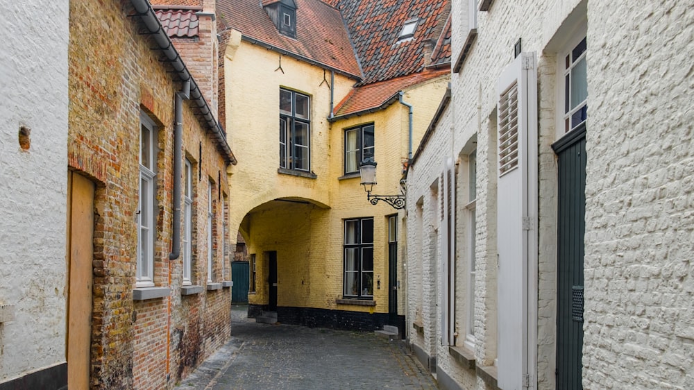 white and yellow concrete houses at daytime