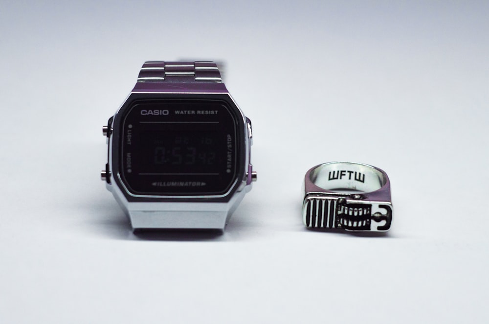square silver-colored Casio watch