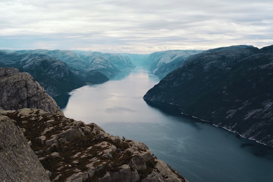 body of water between mountains at daytime in Stavanger Norway