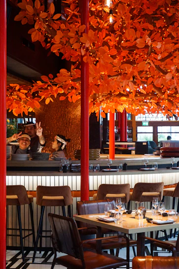 A vibrant collage of East Orange’s diverse restaurant dishes and cozy dining spots.