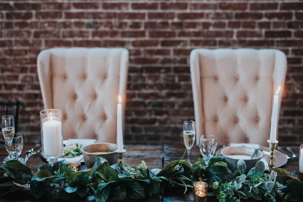 two beige winged chairs