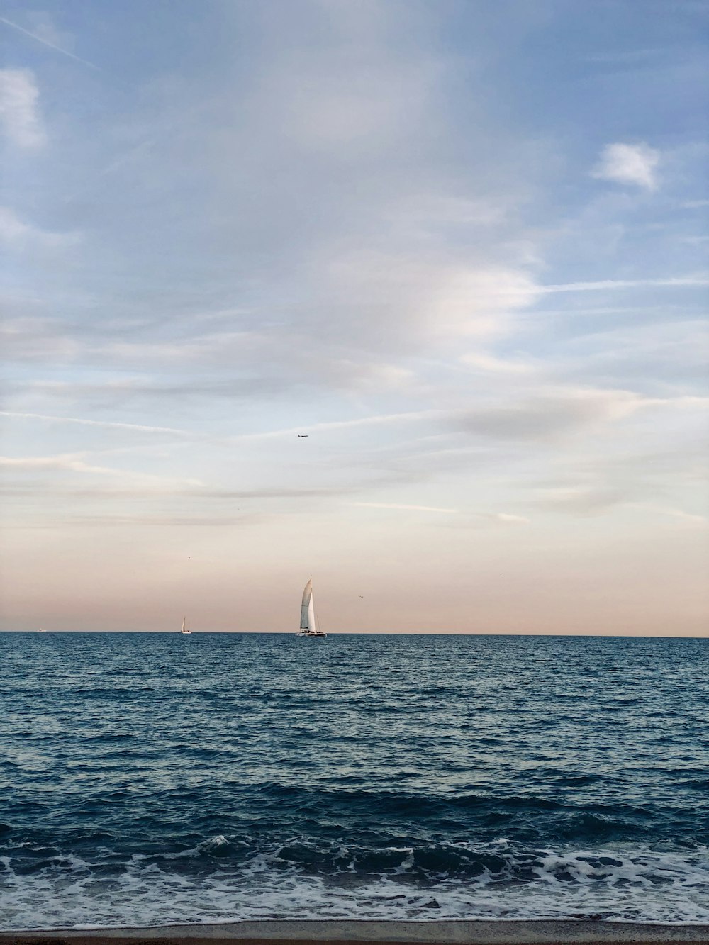 sailboat on body of water