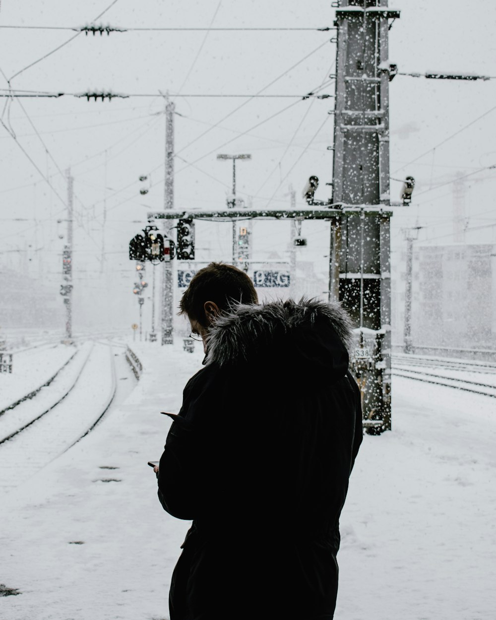 man standing on snowfield