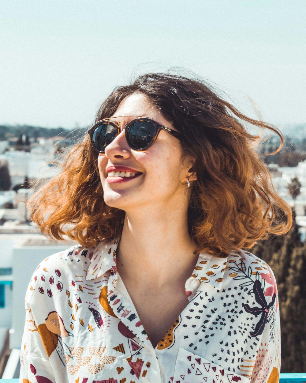 woman in white and yellow collared top