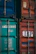 A close-up of a well-maintained used shipping container with secure locks and clean paint.