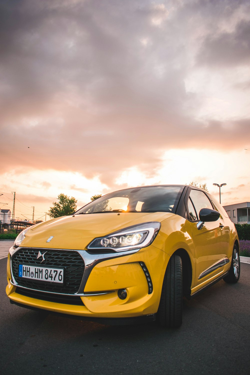 yellow 3-door hatchback