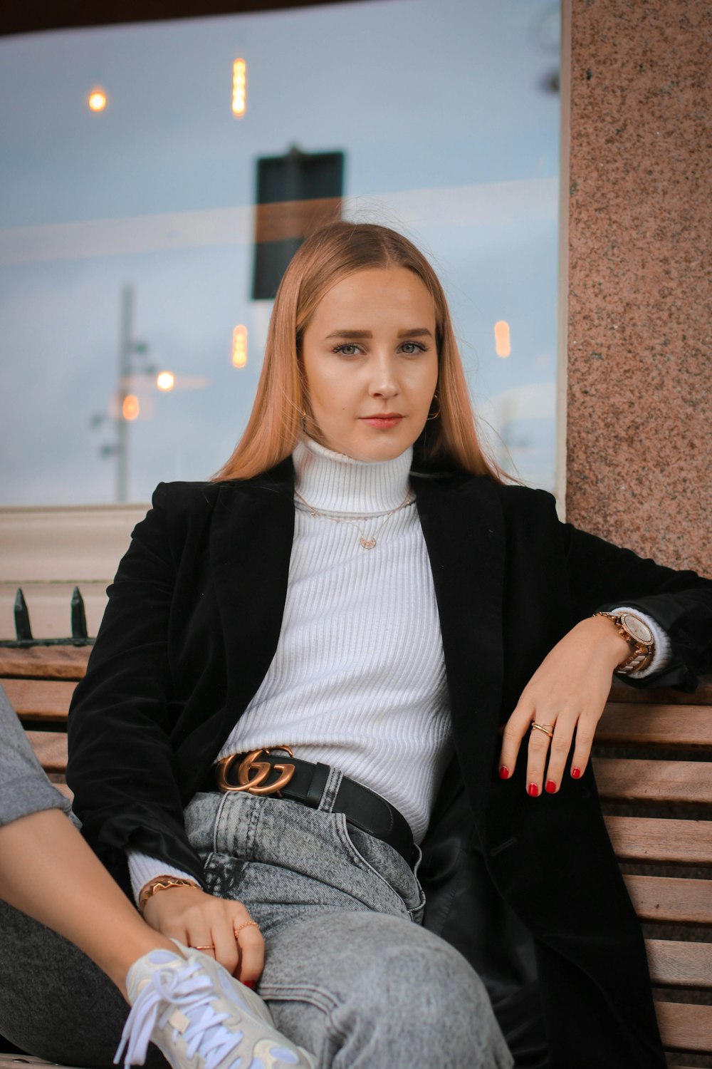 woman sitting on bench