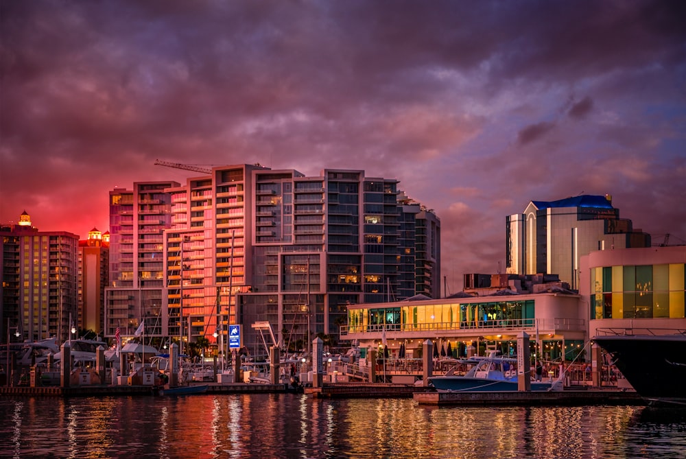 cityscape under grey and red sky