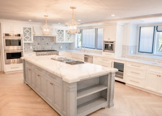 two beige pendant lamps in kitchen