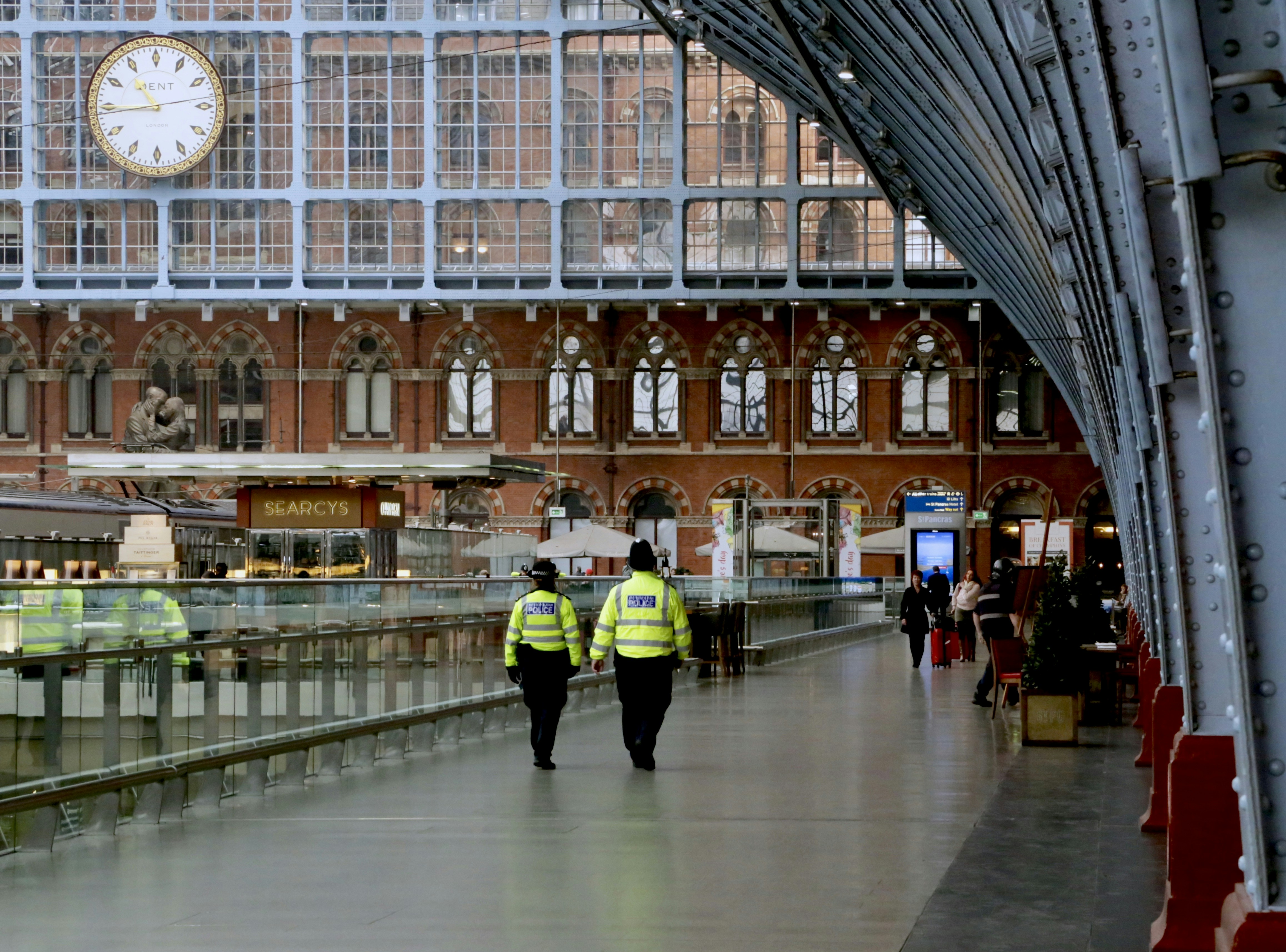 two men's green reflective vests