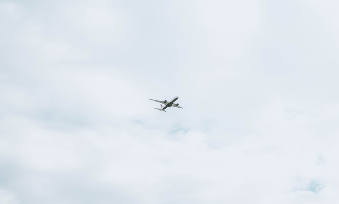 flying passenger plane during daytime