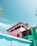 A freshly painted building with vibrant colors under a clear blue sky.