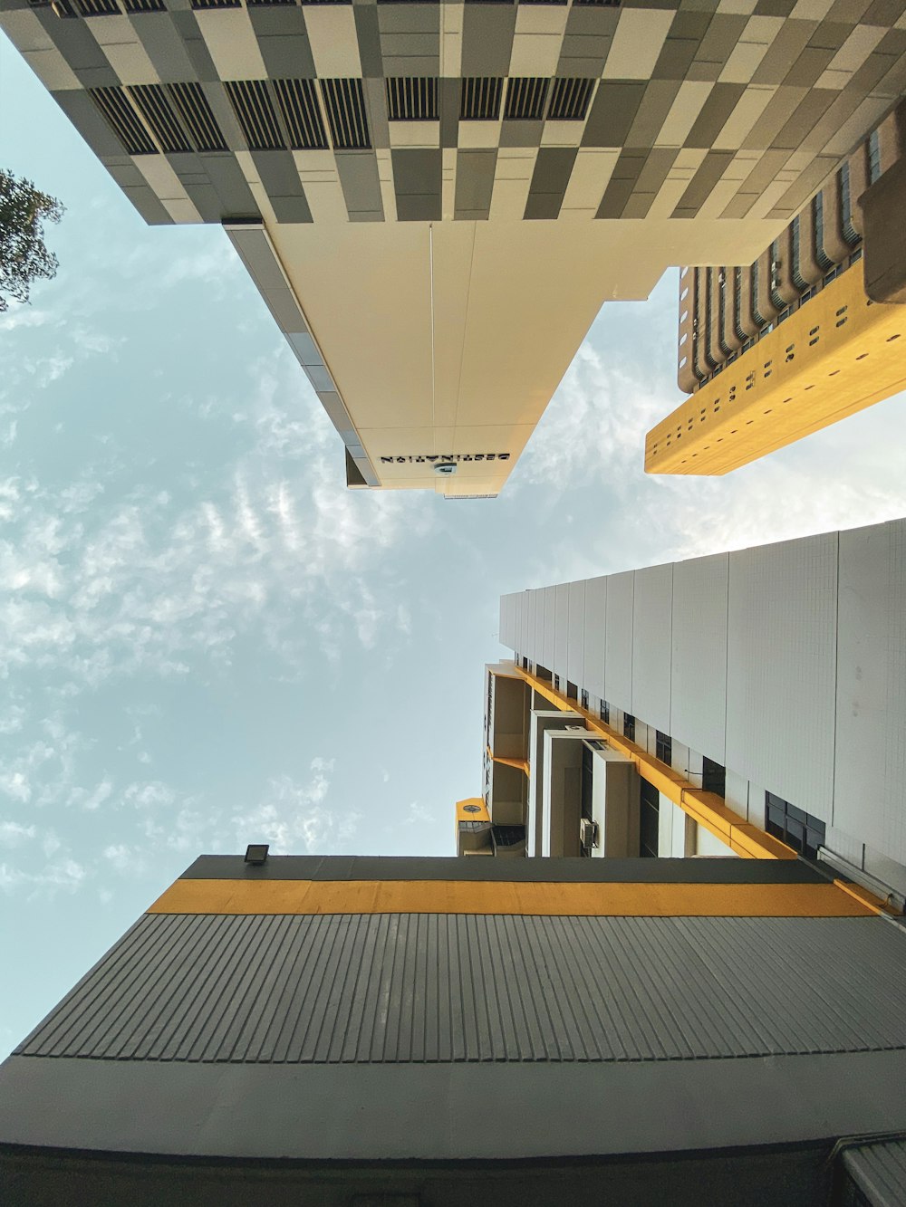 low-angle photography of concrete buildings at daytime