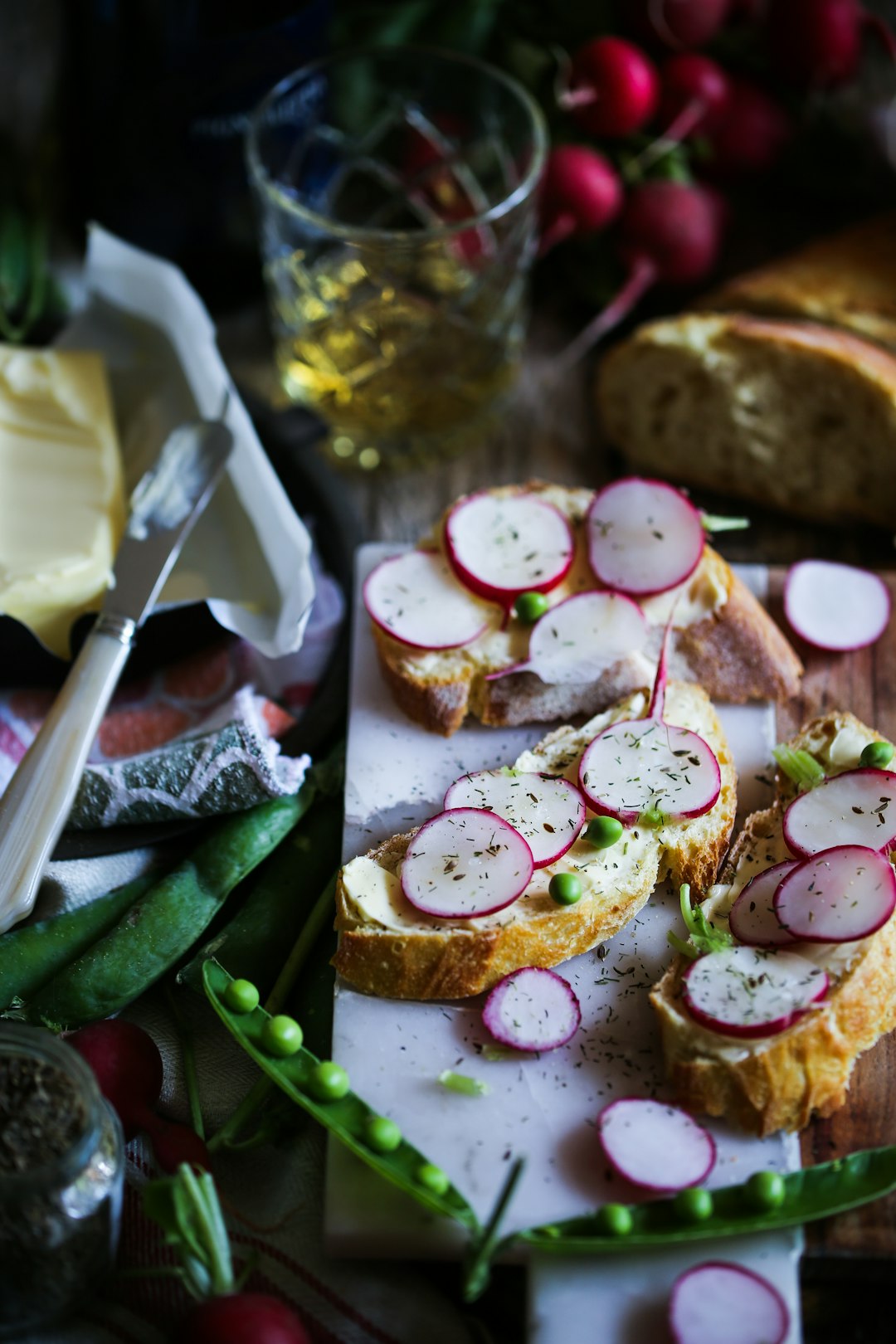 bread with vegetable on brown slab