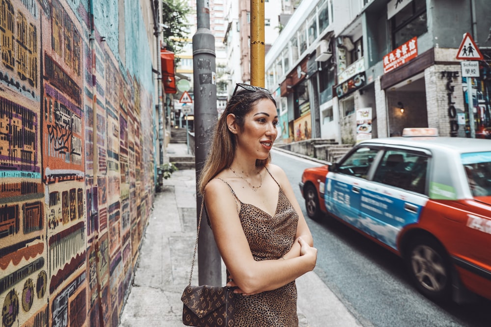 woman standing near road