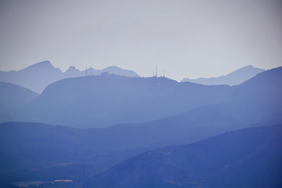 A serene view of Cantareira mountain range blending with digital code elements.