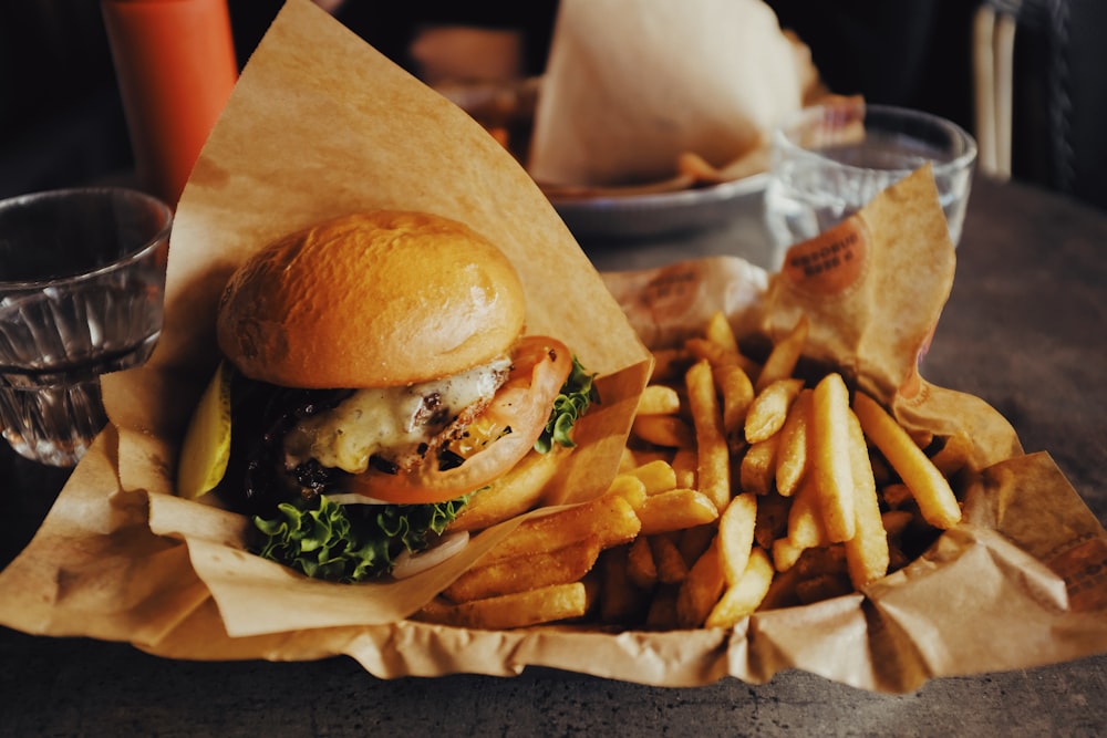 cheeseburger and fried potatoes