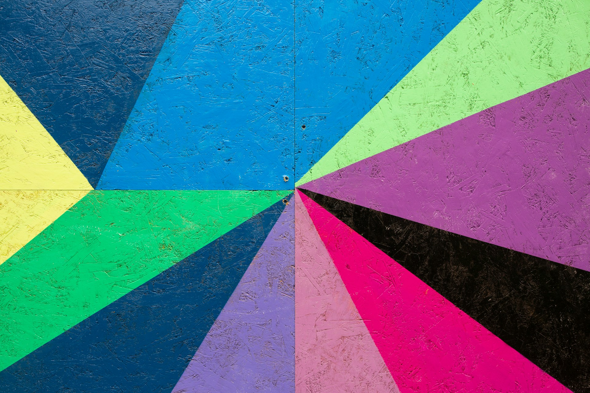 a multicolored umbrella with a black bottom