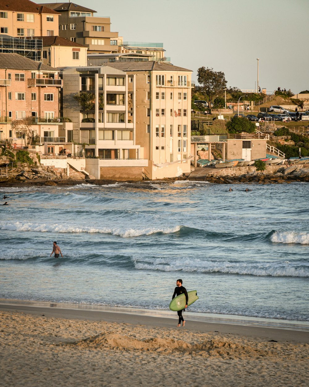 man holding surfboard