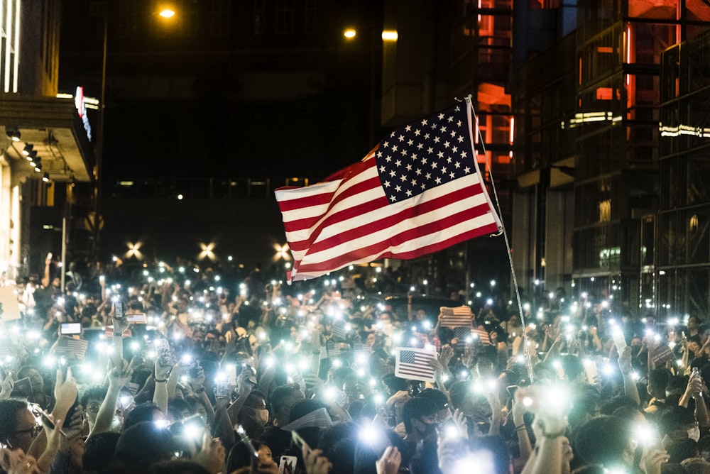 person holding flag of USA